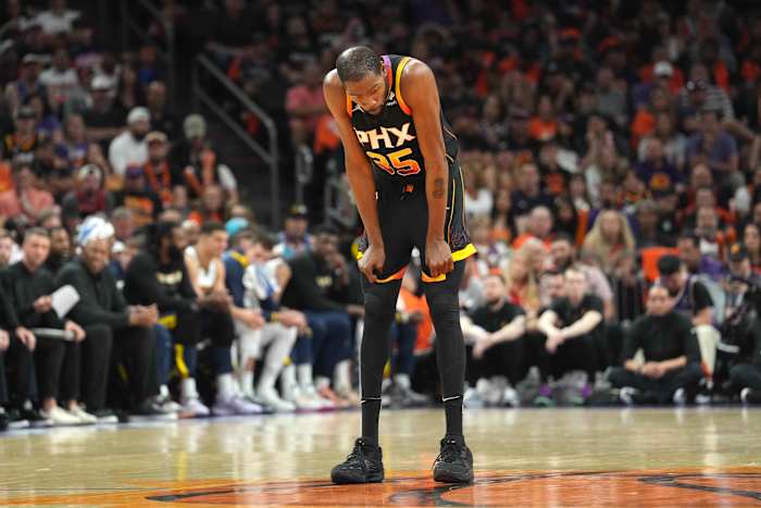 Phoenix Suns forward Kevin Durant looks on during a game.